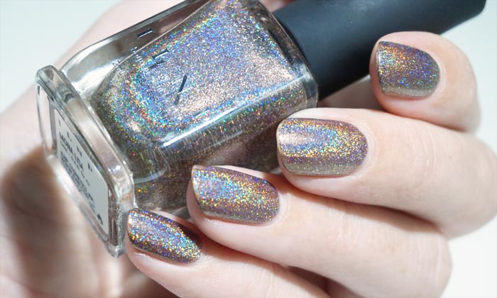 swatch of ilnp mona lisa in strong light, showing the holographic effect