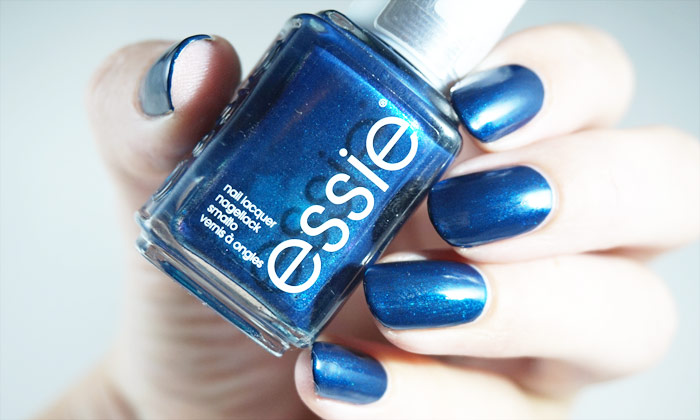 swatch of essie bell-bottom blues in strong artificial light
