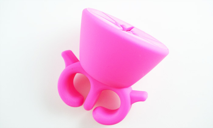 picture of a neon pink nail polish holder ring