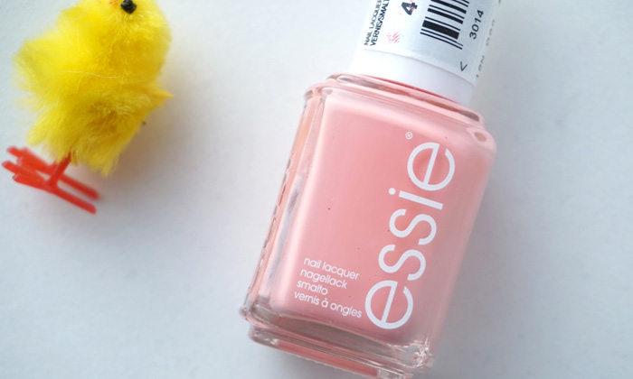 bottle of Essie excuse me sur, a coral pink polish from Essie's spring collection