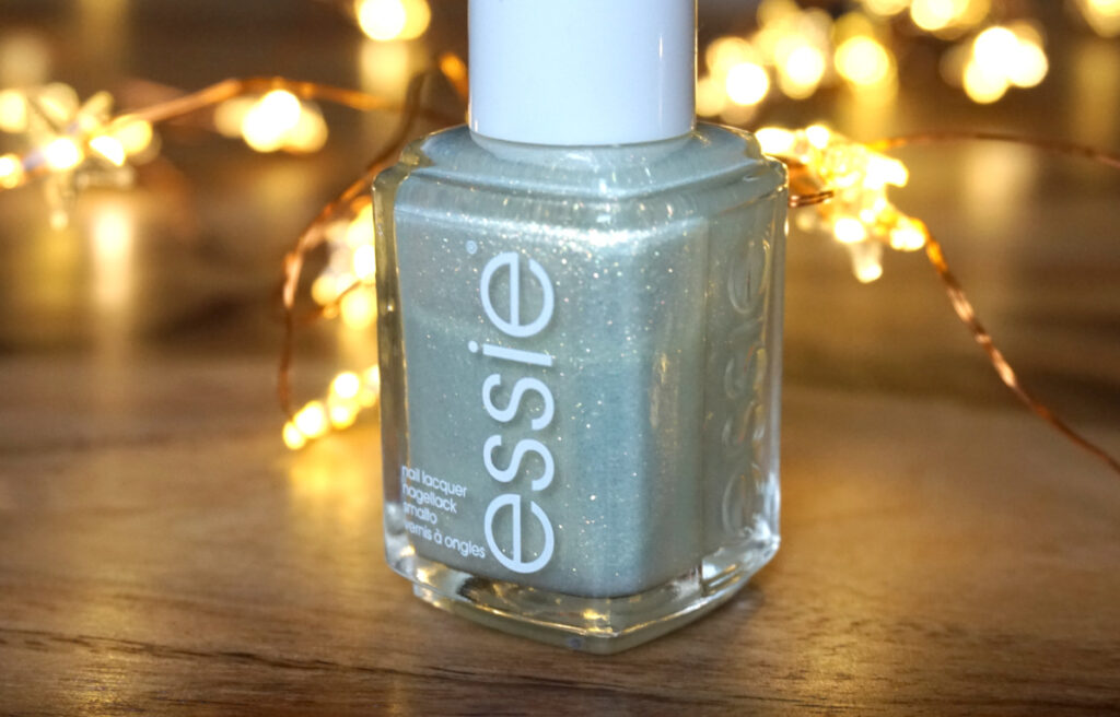 Essie peppermint condtion bottle. A mint with golden shimmer.
